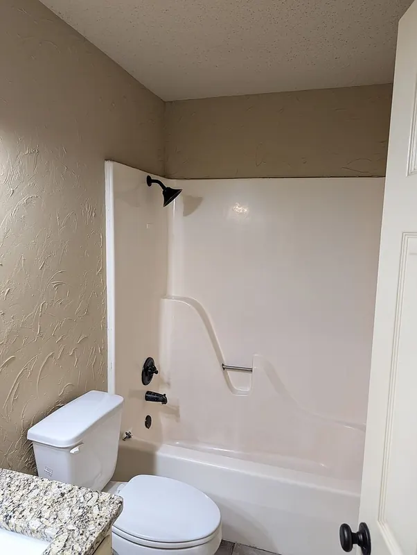 Full bath with tub and shower